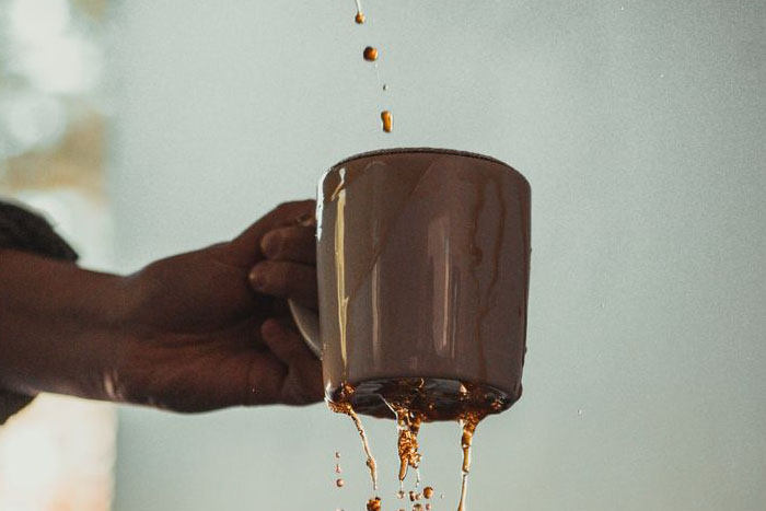 Coffee cup overflowing