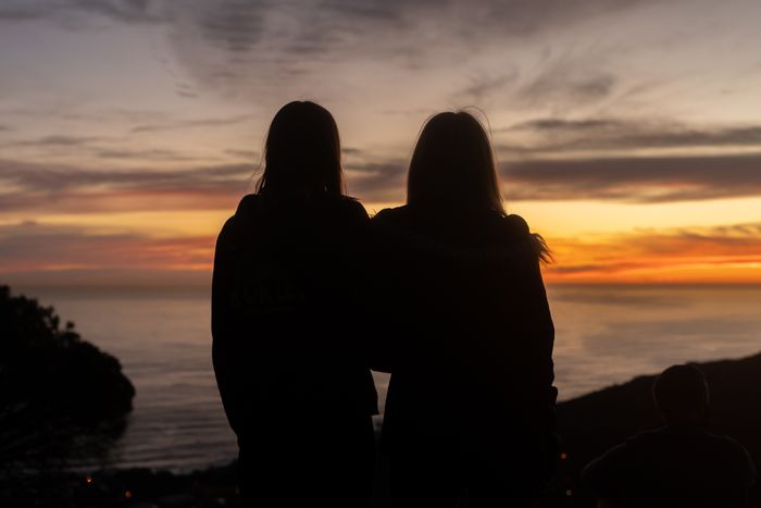 Photo of two friends in silhouette: Photo by Brent Ninaber on Unsplash